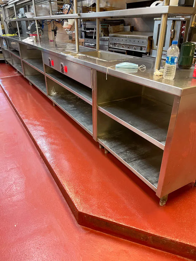 Red epoxy commercial kitchen floor, concrete floor coating serving South Nashville, TN