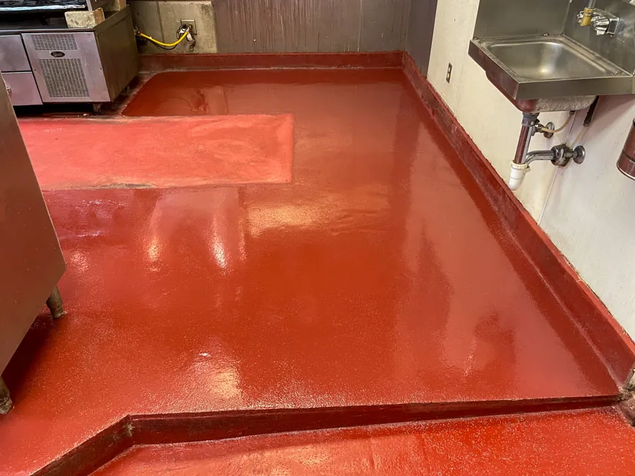 Red epoxy floor in a commercial prep area, commercial epoxy flooring serving Nashville, TN