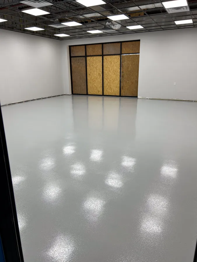 White epoxy commercial floor, concrete floor coating serving Berry Hill, TN